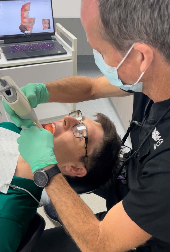 Scanning patients teeth for Invisalign treatment in Brisbane